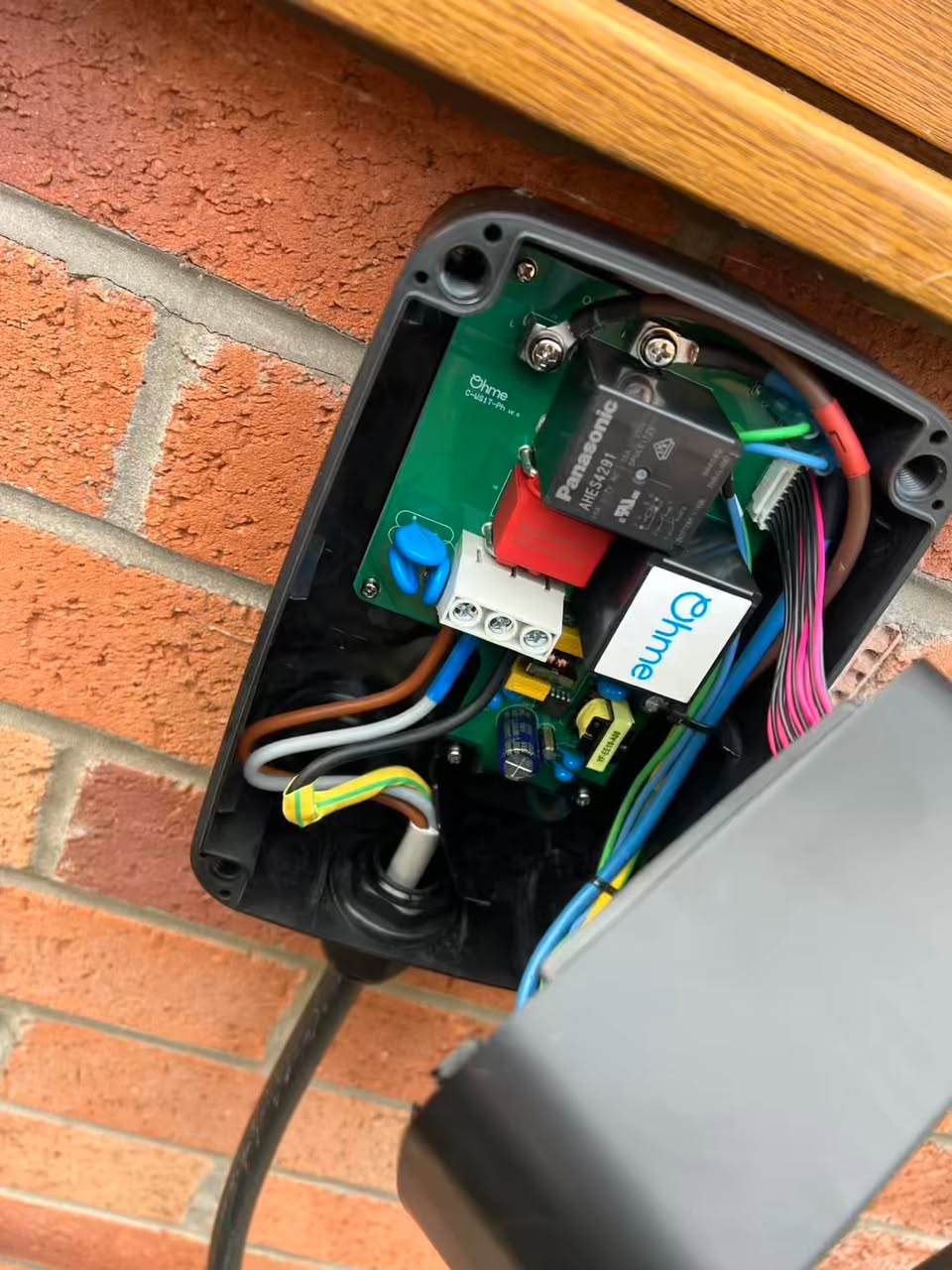 Internal connections of an Ohme EV charger installed by Imrie Electricals